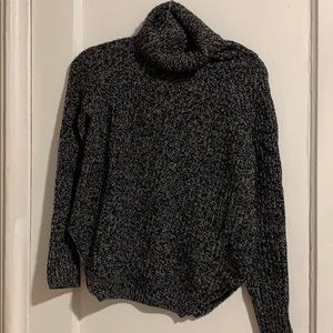 Salt and pepper colored turtle neck
